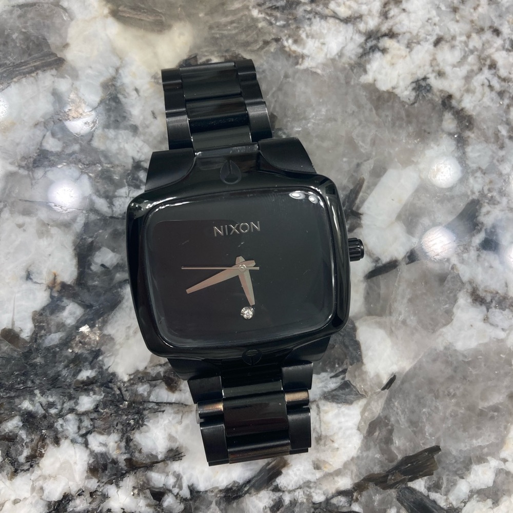 Black Nixon watch with Diamond